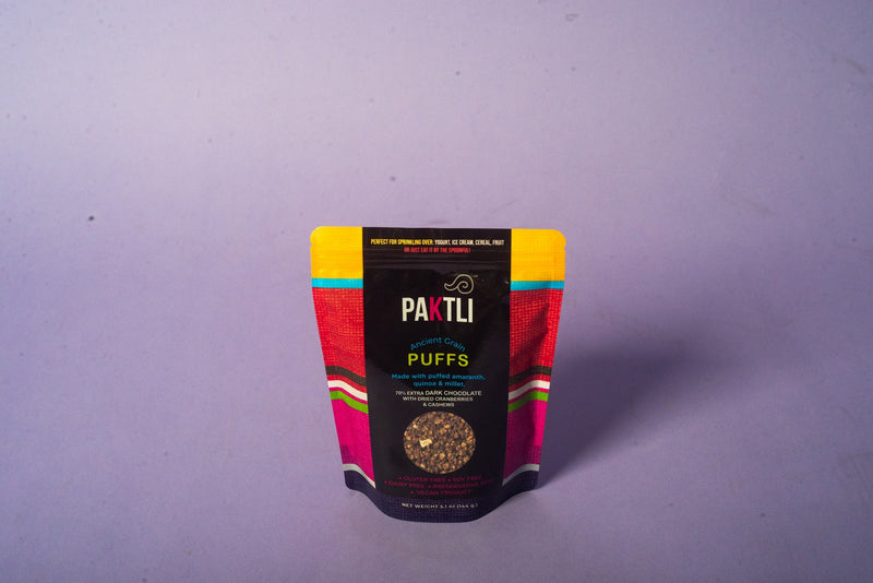 PAKTLI Extra Dark Chocolate With Dried Cranberries and Cashews Ancient Grain Puffs